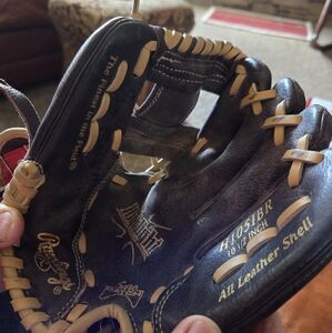 Rawlings Black and Cream Leather Baseball Glove designed for young players 12 Yr